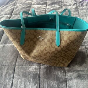 Coach City Tote Never worn. Teal and Khaki. It’s cute just not my style.